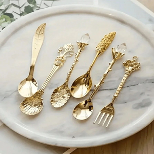 Beautiful matte gold cutlery featuring exquisite white mother of pearl mosaic <b>tiled</b> handles Available at wholesale prices - Product Image 5