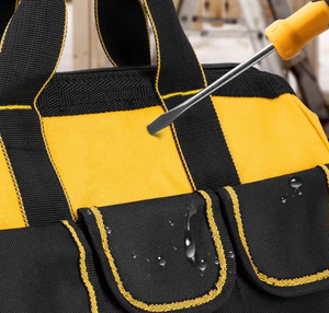 Sac à outils jaune et noir avec plusieurs poches et fermeture à glissière pour le rangement de l'équipement - Product Image 6