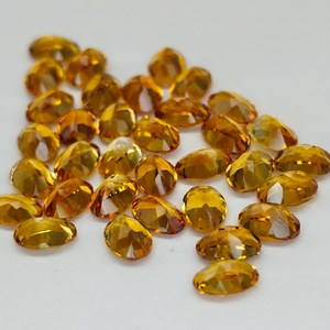 พลอยซิทรินแท้ธรรมชาติทรงรีขนาด 7x5 มม. สีเหลืองทองเจียระไน แบรนด์ HASNAIN GEMS สำหรับทำแหวน ต่างหู และเครื่องประดับ - Product Image 2