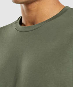 T-shirt tendance vert uni coupe ample avec logo personnalisé en tissu 100% coton, col rond, faible MOQ, streetwear pour hommes - Product Image 4