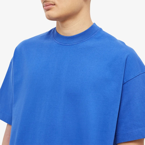 เสื้อยืดคอกลมแขนสั้นผู้ชาย ผ้าฝ้าย 280 กรัม สีพื้น ทรงโอเวอร์ไซส์ สไตล์ลำลอง โลโก้ด้านหน้า ขายดี ดีไซน์เรียบง่าย - Product Image 6