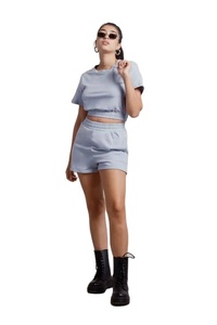 Ensemble deux pièces uni col rond manches courtes ourlet élastique Top court et taille élastique poche latérale Short ensembles de survêtement femmes - Product Image 3