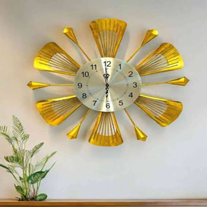 Striking <b>golden</b> starburst <b>wall</b> <b>clock</b> features fan shaped accents and clean modern lines, available at wholesale prices. - Product Image 1