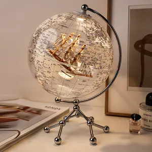 Wellfun 10 pollici globo d'argento terra con illuminazione barca a vela popolare regalo creativo ornamento decorativo terra che gira