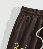 Pantalon de jogging ample et décontracté en coton pour homme, style streetwear, avec cordon de serrage et coupe évasée