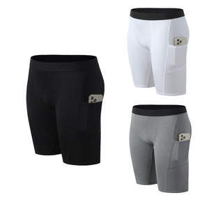Shorts décontractés gris pour hommes avec poches latérales, séchage rapide, anti-plis, taille élastique, taille mi-haute, en toile tricotée de polyester, style uni - Product Image 4