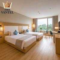 Ensemble complet de mobilier de chambre d'hôtel Vantel avec tête de lit, armoire, bureau, meuble TV pour projets hôteliers FF&E