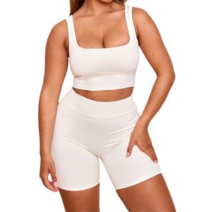 ชุดออกกำลังกายผู้หญิงคุณภาพสูงแบบขายส่ง ชุดกีฬาบราพร้อมกางเกงขาสั้นเอวสูงสำหรับออกกำลังกายและฟิตเนส - Product Image 1