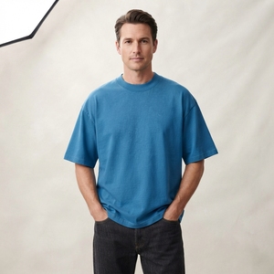 T-shirt à épaules tombantes, T-shirt court, T-shirt homme uni à col rond et manches courtes, coupe classique, décontracté, en jersey de coton bleu - Product Image 1