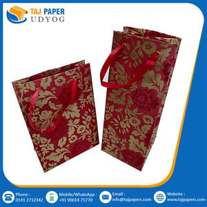 Alta calidad personalizado impreso flor diseño Kraft papel hecho a mano bolsa de la compra al por mayor precio utilizado para el embalaje con logotipo personalizado - Product Image 2