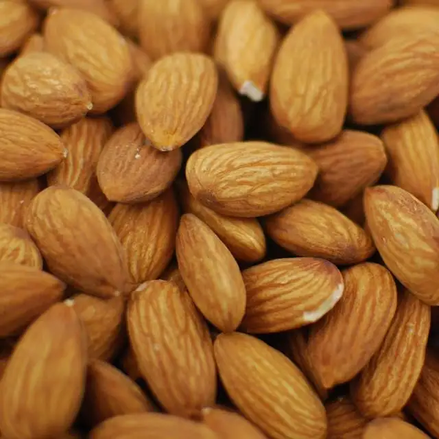 Vuelos de almendras crudas en shell nueces de badam almendras al por mayor badam tuerca