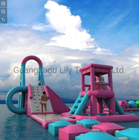 Parc aquatique gonflable commercial flottant avec toboggans et obstacles pour lac, plage et complexe hôtelier
