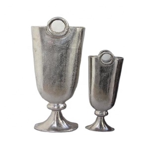 Florero de aluminio fundido ovalado con mango redondo, de níquel en acabado rugoso, disponible en otros acabado - Product Image 1