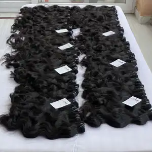 Factory wholesale price raw indian hair bundle,100% human hair extensions,raw hair vendors natural wave virgin indian hair