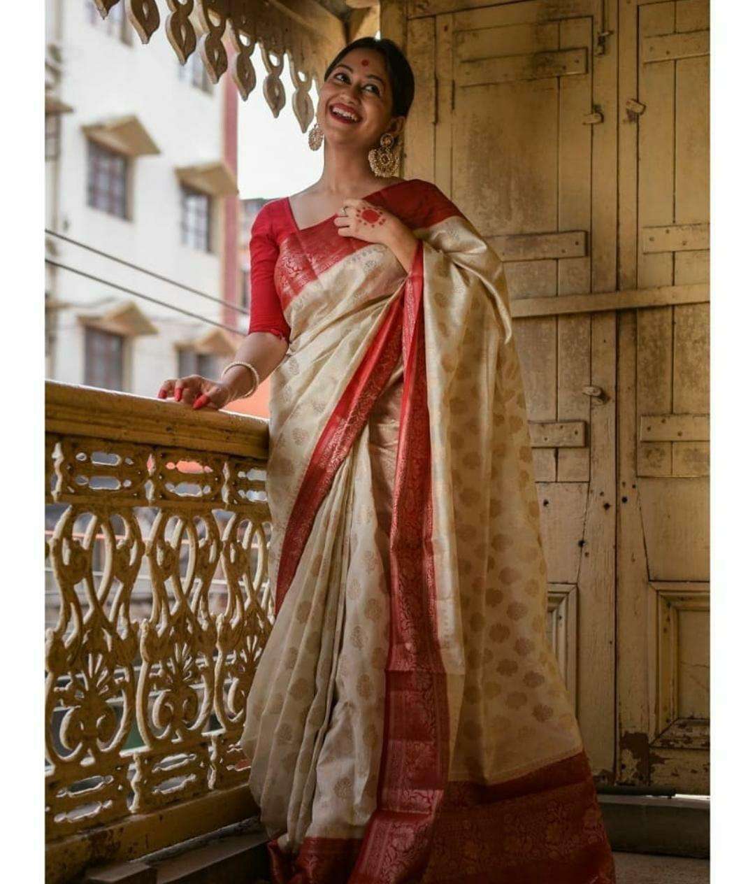 red and white saree with stitched blouse