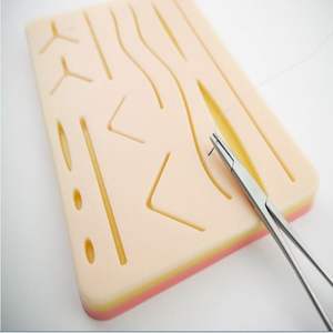 Coussinet de suture en peau de silicone pour étudiants avec source d'alimentation de machines - Product Image 1