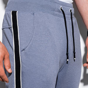 กางเกงขายาวทรงตรงเอวสูงผ้าผสมโพลีเอสเตอร์/คอตตอนสำหรับผู้ชาย สไตล์ลำลอง ทรงหลวม สตรีทแฟชั่น น้ำหนักเบา ผ้าแคนวาส แต่งลายปัก - Product Image 3