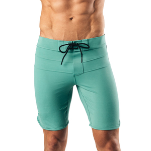 กางเกงขาสั้นผู้ชายแห้งเร็วระบายอากาศสไตล์ลำลองสีพื้นสำหรับการแข่งขันฟิตเนสแฟชั่นใหม่สำหรับฤดูร้อน - Product Image 1