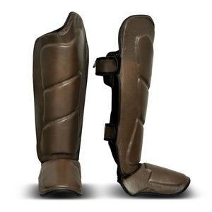Personalizado al por mayor profesional Shin Instep Pads Brace Guard soporte protección PU Material espinilleras - Product Image 1