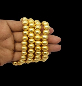 Cuentas de Bali de forma redonda chapadas en oro - Product Image 1