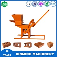 Machine à briques en argile et en ciment manuelle mobile de haute qualité Xm2-40 pour pavés creux autobloquants en technologie canadienne et allemande 6mpa