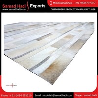 2024 Neueste Design Luxus bestickte Leder teppiche Hand gefertigt von Artisans Designer Hair On Cowhide Leather Carpet