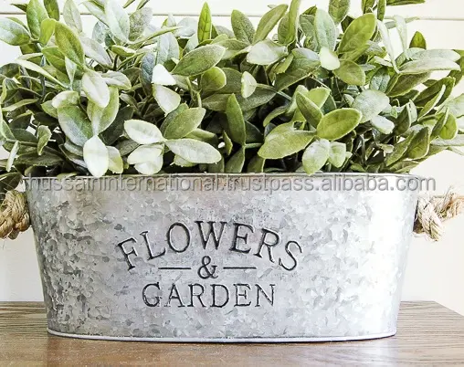 Flower and garden embossed oval planter with rope handles