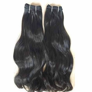 Extensiones de cabello humano indio Remy de alta calidad Cabello de grado de cinta ondulada natural - Product Image 4