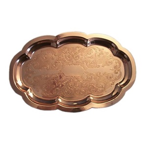 Bandeja para servir comida en relieve de forma ovalada para decoración Metal de alta calidad cobre lujo y diseño moderno - Product Image 1