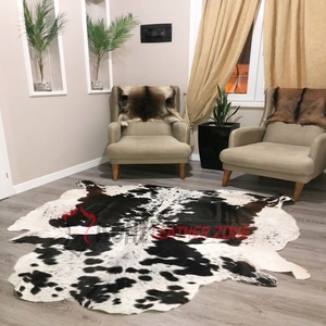 Foshan Hotel decorativo hecho a mano marrón cuero de vaca alfombra Anti-píldora de gran tamaño para muebles y decoración del hogar - Product Image 1