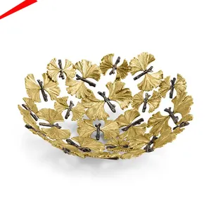Bellissimo ginkgo rotondo in metallo dorato con ciotola a farfalla per la decorazione del tavolo da pranzo