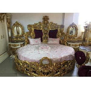 เตียงไม้สักทรงกลมขนาดควีนไซส์ งานแกะสลักหนัก พร้อมโต๊ะข้างเตียง ชุดเฟอร์นิเจอร์ห้องนอนงานฝีมือสุดหรู - Product Image 1