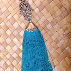 Vente en gros de porte-clés de décoration en acier inoxydable, cuir, nylon, art simple bohème, pendentif avec glands - Product Image 1