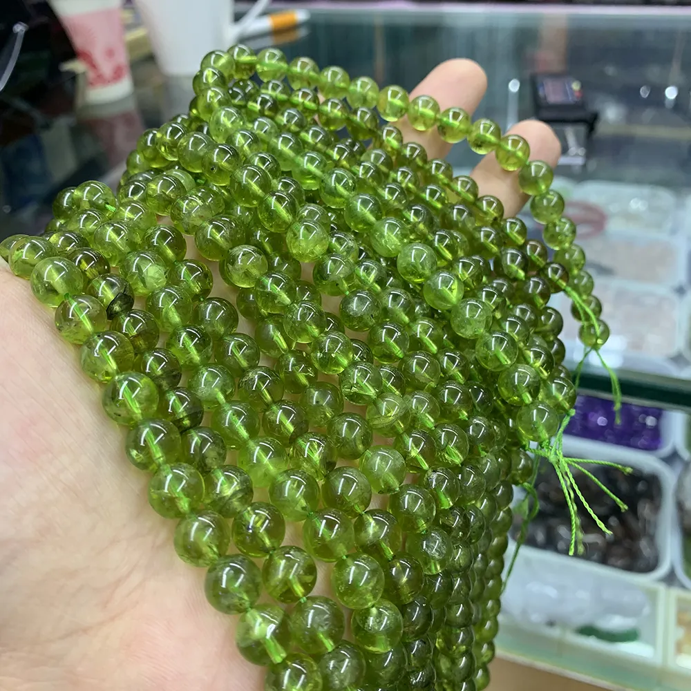 थोक प्राकृतिक Peridot बड़ा आकार 8-9mm दौर मोती उच्च गुणवत्ता ओलीवाइन Peridot खनिज ढीला मोती रत्न