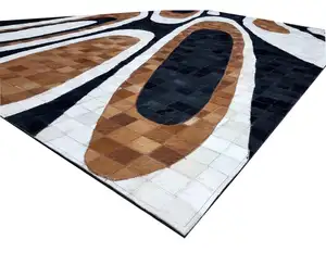 印度制造商的设计师拼布刺绣皮革地毯，用于皮革地毯上的出口头发刮擦皮革地毯