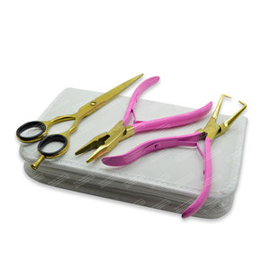 Kit d'outils d'extension de cheveux en acier inoxydable doré et rose - Product Image 1