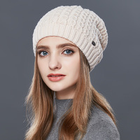 Usine hiver tricot 100% acrylique chapeaux pour femmes chaud Slouchy Beanie chapeau avec fourrure pompon Baggy crâne Ski chapeau en gros