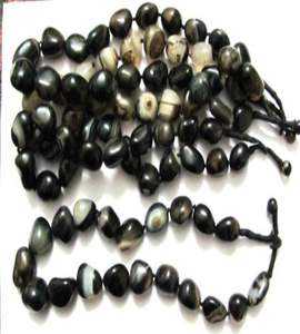 สร้อยคอพลอยโมราสีดำแกะสลัก - Product Image 1