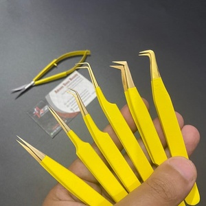 Pince à épiler professionnelle professionnelle en acier durable jaune or avec logo personnalisé pince à épiler extension de cils pointe en fibre - Product Image 1