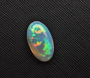 พลอยโอปอลเอธิโอเปียธรรมชาติรูปทรงวงรีเจียระไนรูปทรงหลังเบี้ย,อัญมณีขายส่งจำนวนมากสำหรับการทำเครื่องประดับ,เพชรพลอยปรับเทียบเหลี่ยมเพชรพลอย - Product Image 3