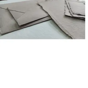 custom made deckle edged handmade paper in sand color suitable for silk screen printing and letter press printing