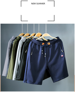 Pantalones cortos cruzados para hombre para entrenamiento de gimnasia y deportes-Pantalones cortos de compresión de fitness al por mayor con patrón sólido para correr y entrenar - Product Image 6