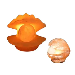 Illuminate Your Space with Charm Himalayan Pink Crafted Small Sea Shell Shaped Salt Lamp - Sian Enterprises