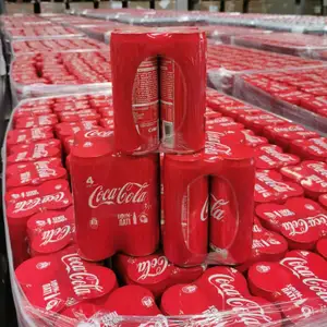 可口可乐软饮料/原装可口可乐330毫升罐。可口可乐瓶