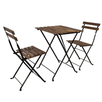 Ensemble bistrot d'extérieur Tarno en bois d'acacia traditionnel avec table basse pliable et structure en acier pour balcon et mobilier de terrasse