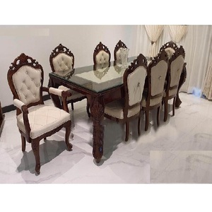 Juego de comedor de lujo antiguo, mesa tallada maciza de madera de teca de primera calidad, sillas decorativas de diseñador - Product Image 1