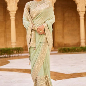 Sari de diseñador elegante y de moda con trabajo manual pesado y Sari de trabajo de apliques hermosos para mujeres para festivales y bodas - Product Image 1