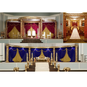 Exclusivo Escenario Mandap Jali Dorado para Bodas, Fabricante de Mandaps Dorados para Bodas Indias, Mandaps de FRP para Bodas del Sur de la India, Reino Unido - Product Image 1