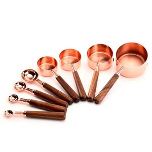 "Elegant 7-Piece Copper Measuring <b>Set</b> with Wooden Handles Durable and Stylish for Precise Cooking and Baking" - Product Image 1