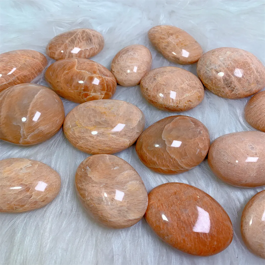 Piedra Natural pulida para decoración, piedra lunar de naranja, melocotón, Palma curativa de cristal, venta al por mayor
